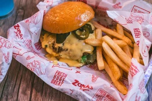 spicy burger with jalapenos hot sauce